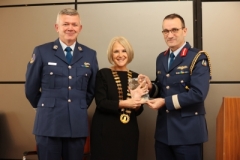 Chief of Air Staff Support, Mick Moran and Brigadier General Rory O’Connor, Irish Air Corps receiving a presentation from Mairead Fleming, deputising for the  Chamber President to celebrate their 100 year anniversary.
